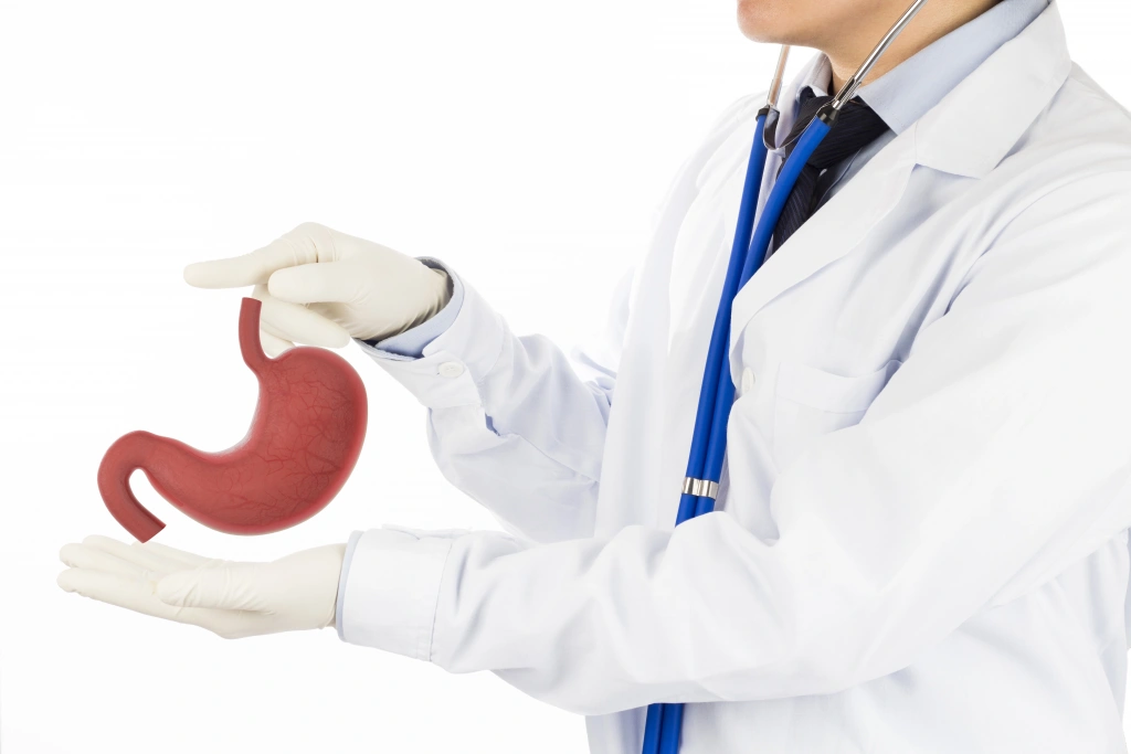 midsection-doctor-holding-medical-equipment-against-white-background.webp