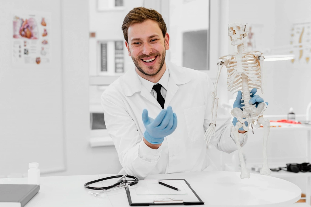 medium-shot-doctor-holding-skeleton.webp